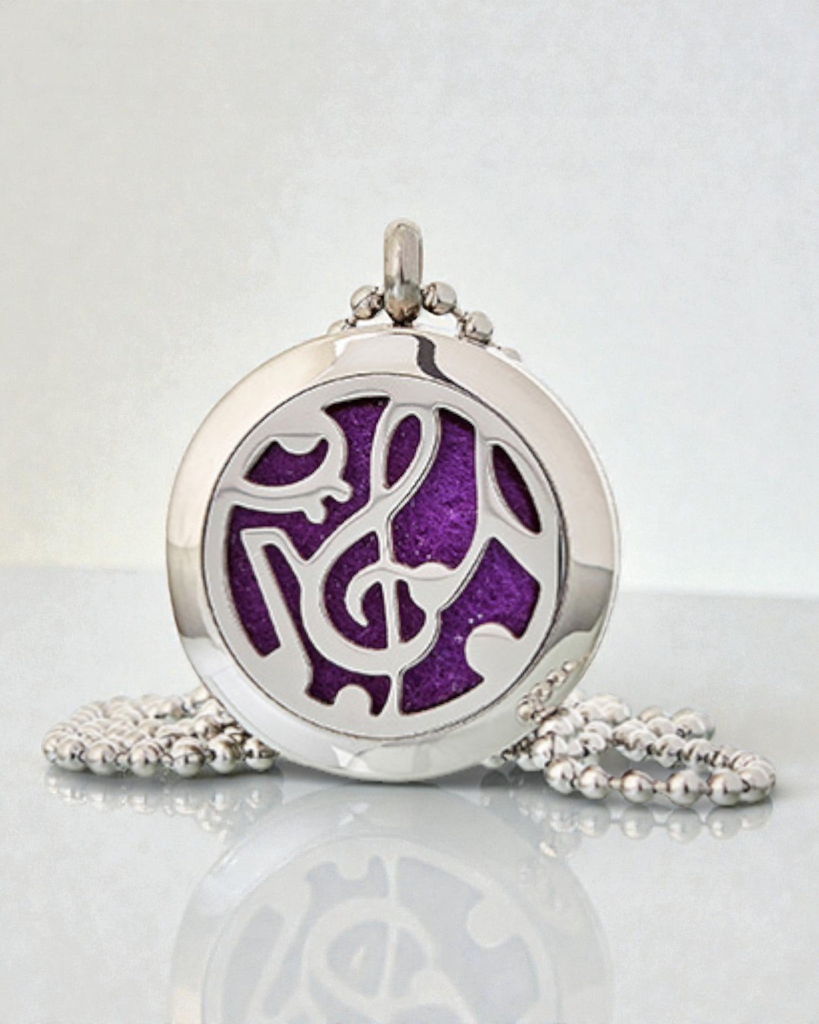 Doftsymfoni – aromaterapeutiskt halsband med motiv av musiknoter 25 mm