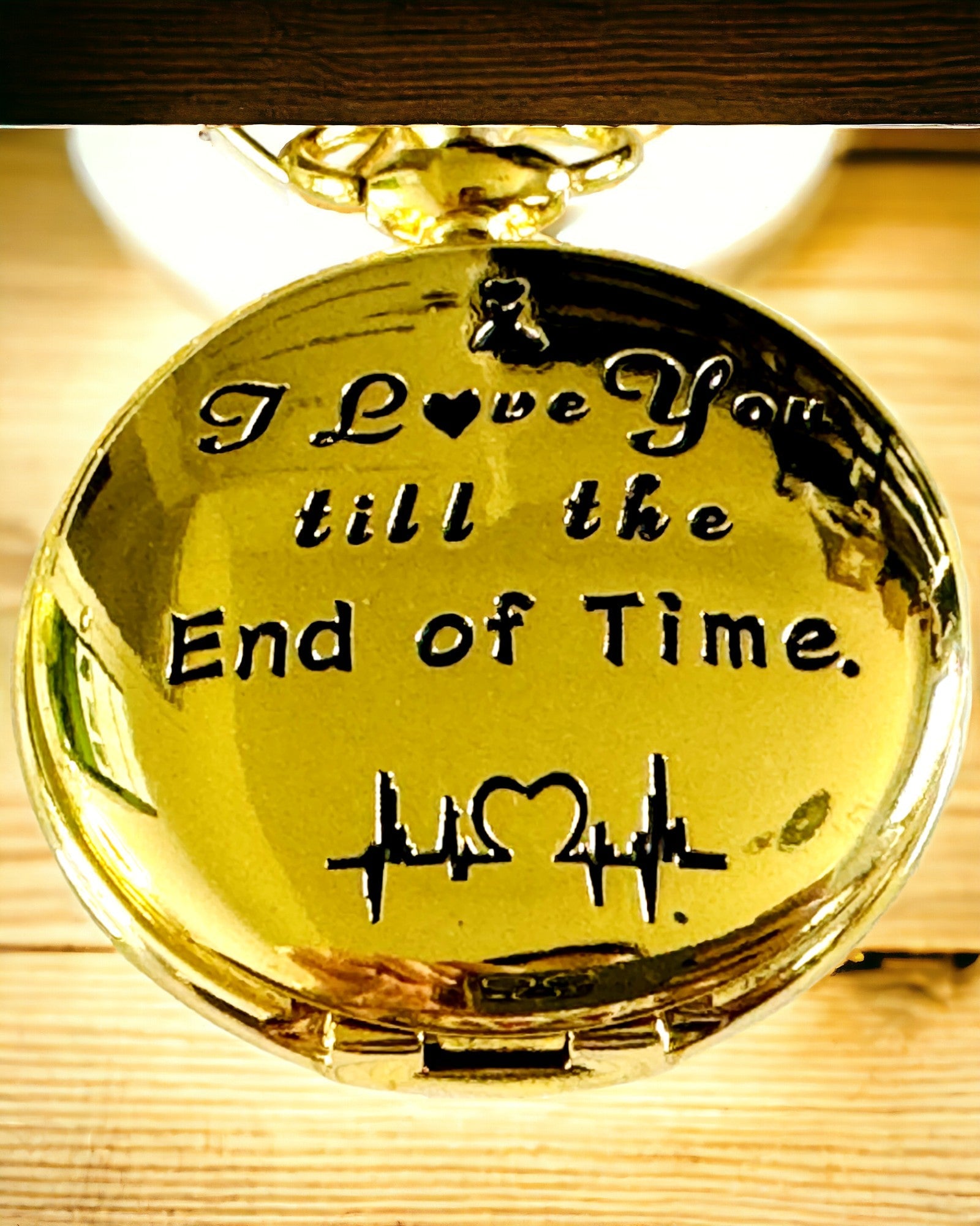 Fickur i guld med retrostil och möjlighet till gravyr