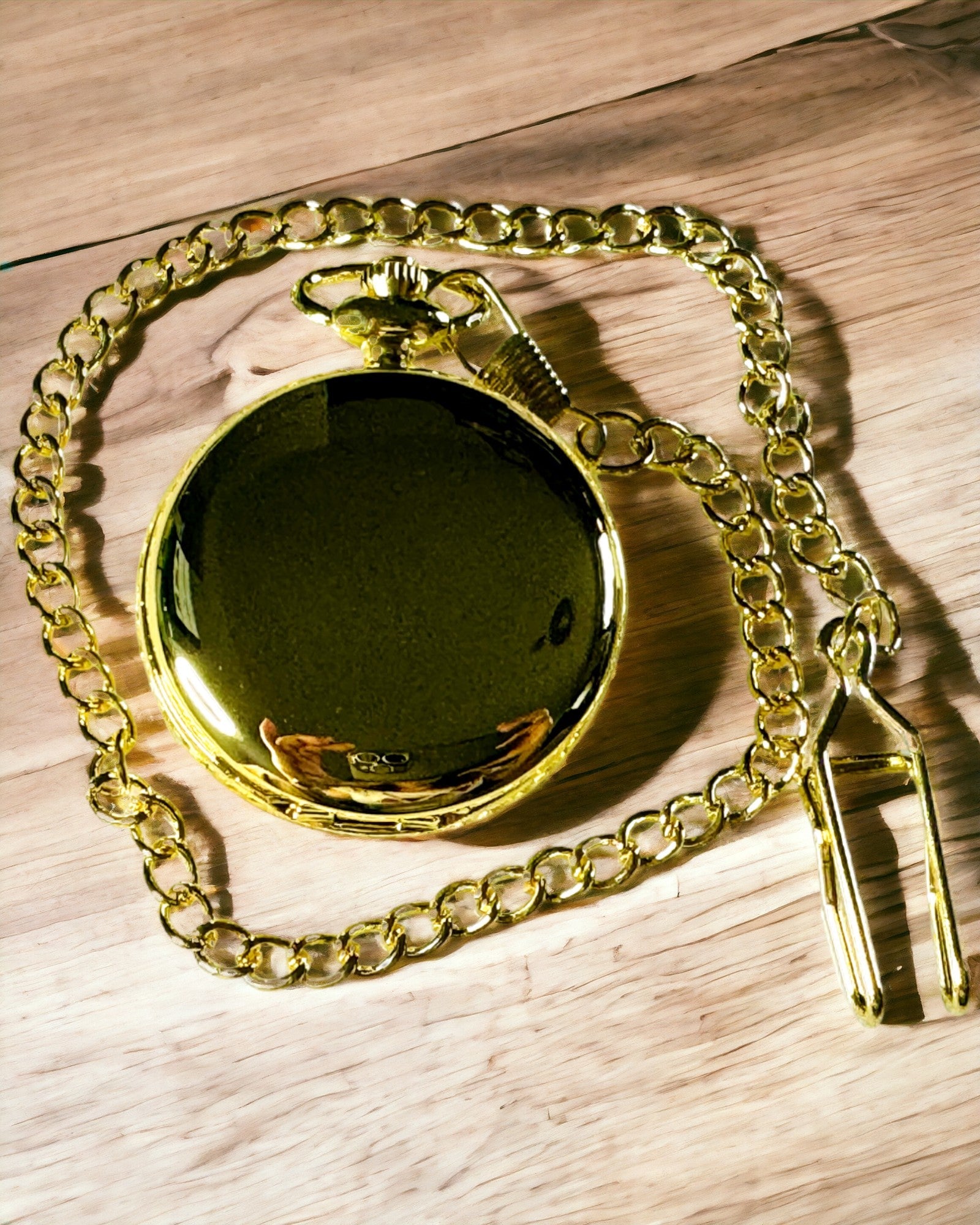 Fickur i guld med möjlighet till gravyr