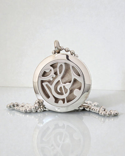 Doftsymfoni – aromaterapeutiskt halsband med motiv av musiknoter 25 mm