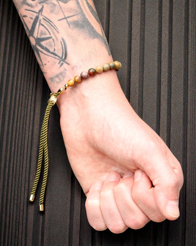 Moss Aura – Armband med Picasso-jaspis och 18K guld på grön snodd