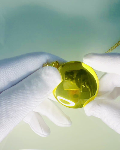 Fickur i guld med möjlighet till gravyr